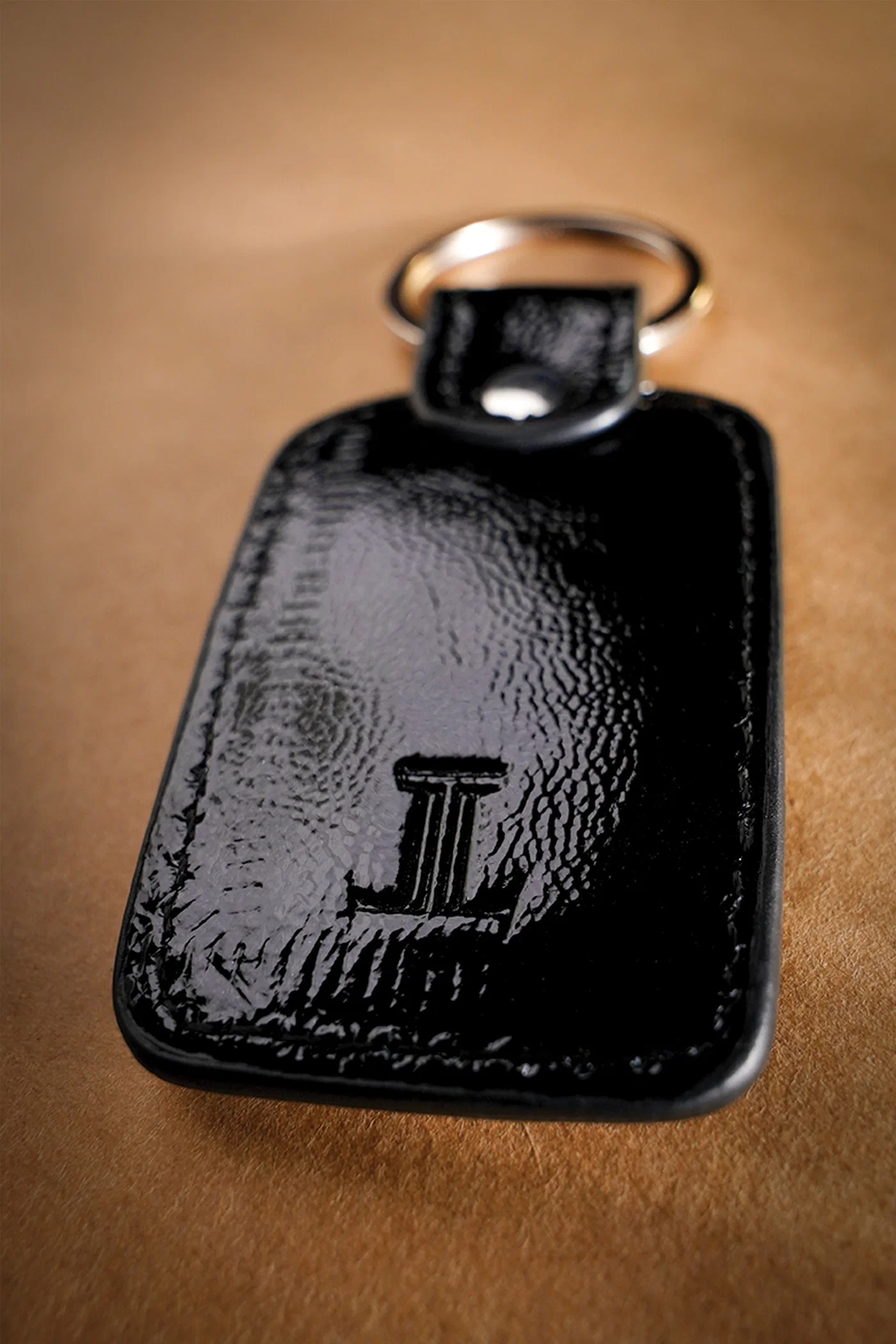 braided leather key chain black woven back view logo julke braided leather key chain black woven back view logo julke