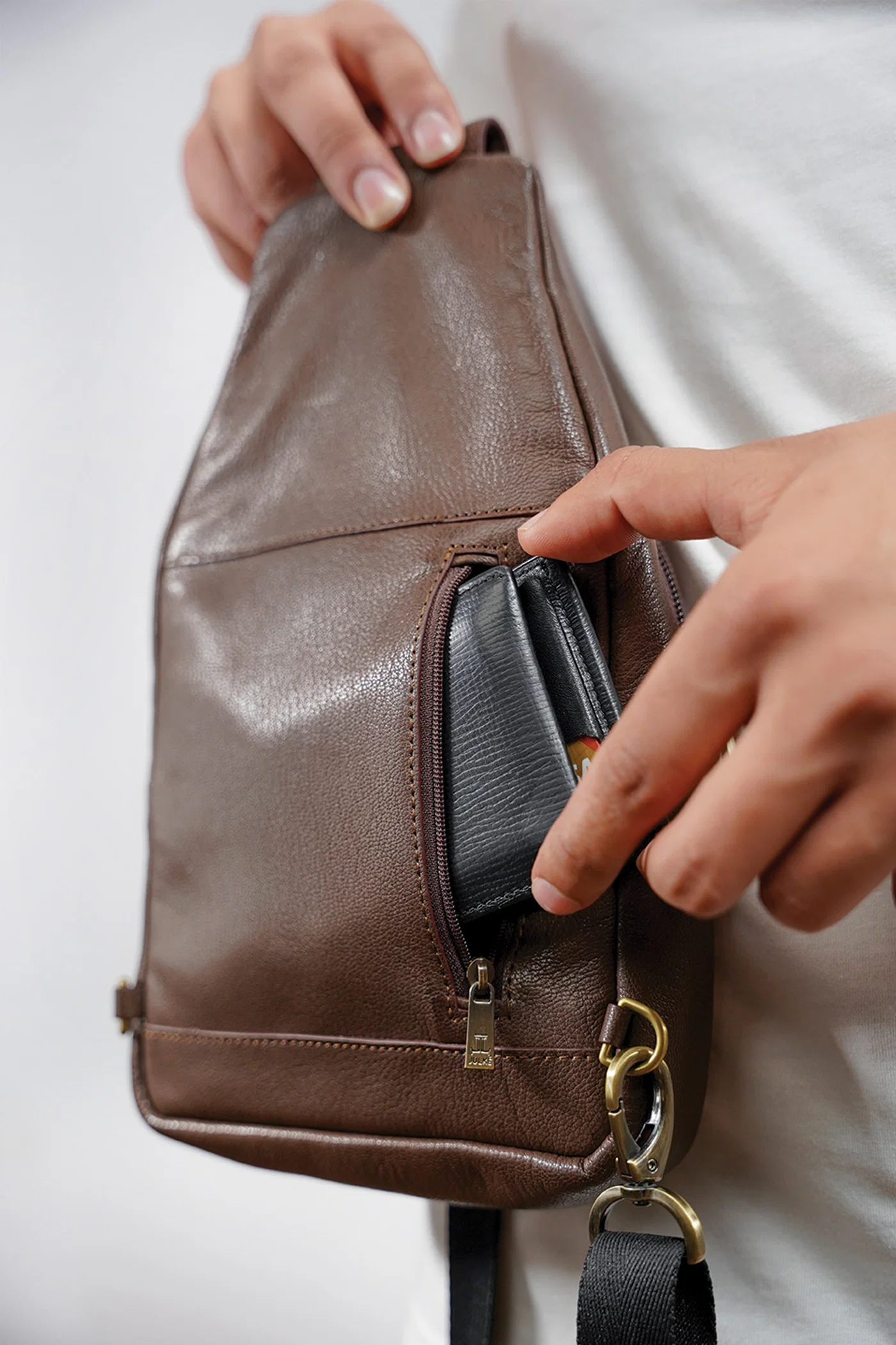 carlow leather crossbody travel bag dark brown back view julke carlow leather crossbody travel bag dark brown back view julke