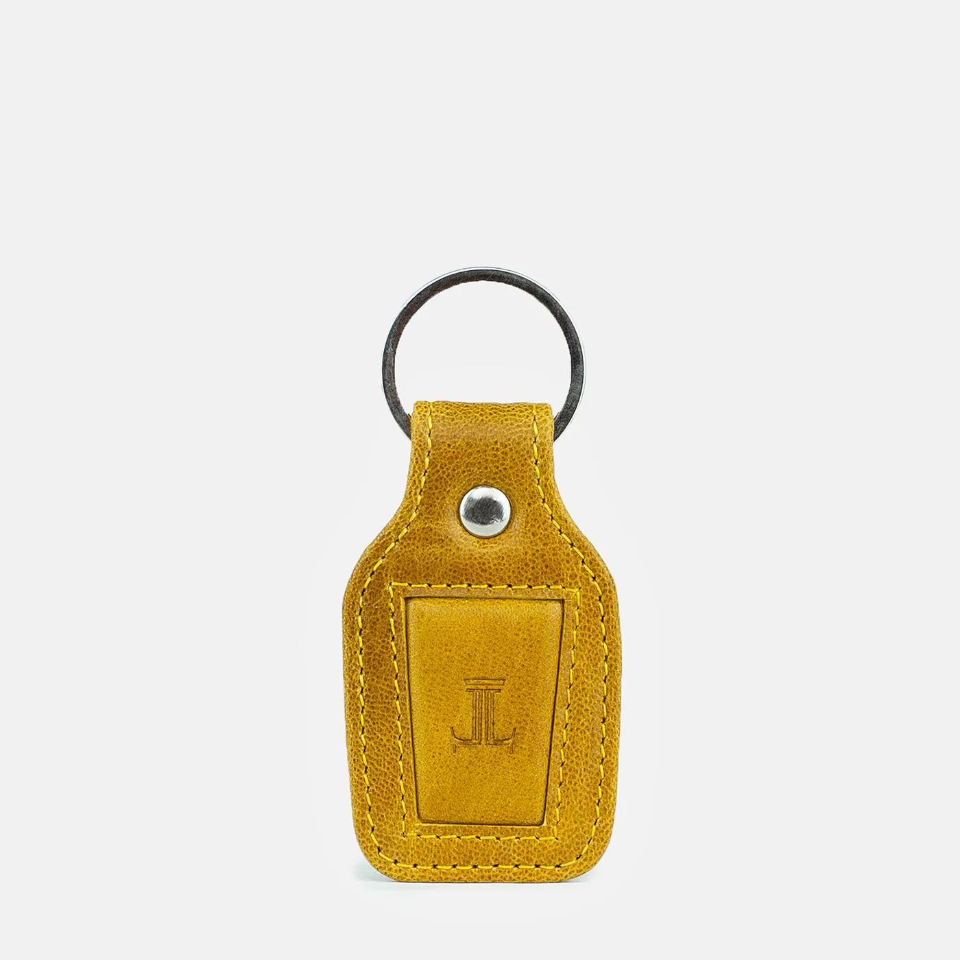 leatherkeychain mustardcolor frontview julke leatherkeychain mustardcolor frontview julke