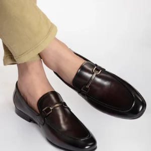pierre mens leather shoe slip on round toe two tone antique walnut rubber leather sole metal horsebit buckle three quarter view julke